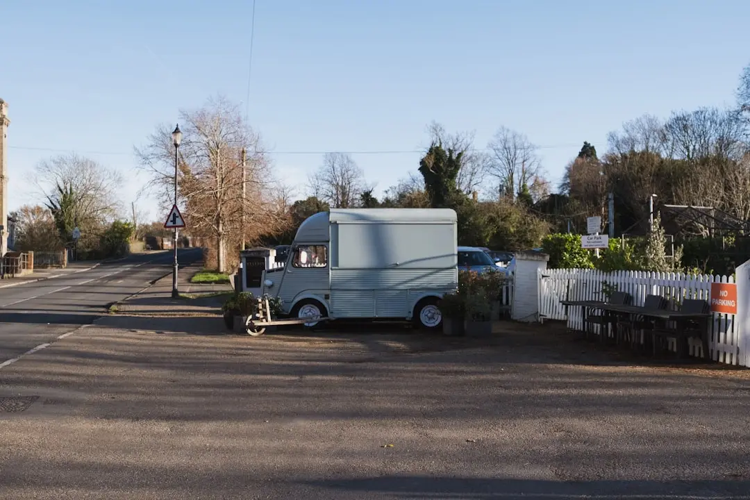 A truck parked on the side of a road — Photo by David Walker | Walker Design Co. on Unsplash