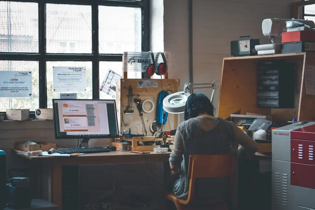 woman sitting in front of a wooden desk — Photo by Darya Tryfanava on Unsplash