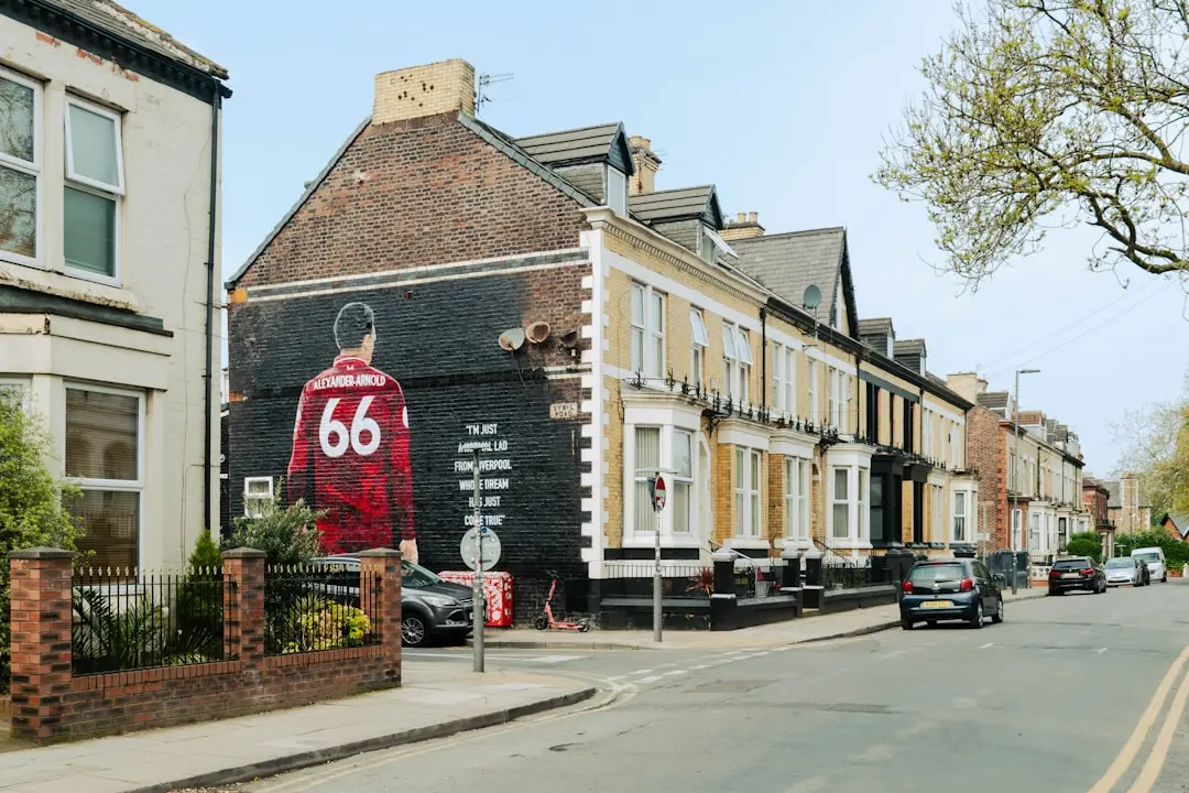 Mural of a man wearing a jersey with number 66. — Photo by Balázs Gábor on Unsplash