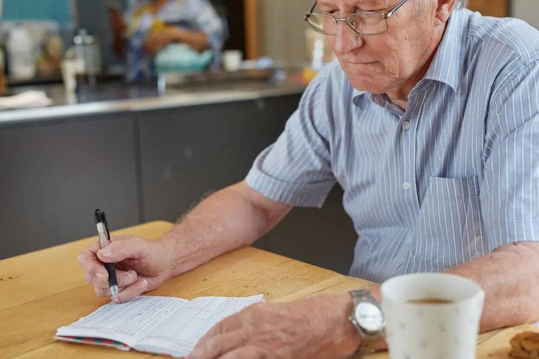 a person writing down blood glucose results — Photo by Sweet Life on Unsplash