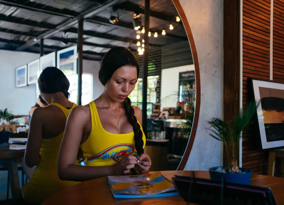 woman standing in front of table — Photo by Igor Starkov on Unsplash
